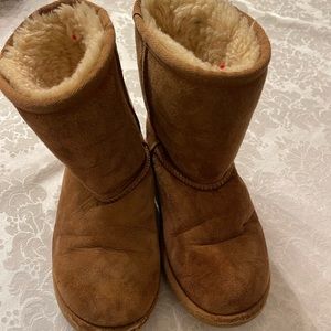 Kids size UGG boots. Used. Size 2. Lots of life left. See pictures for flaws
